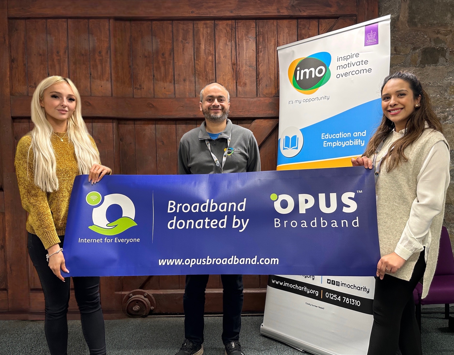 Charlotte Core from Opus is pictured with Samir Khan and Faz Sidat from IMO charity Blackburn